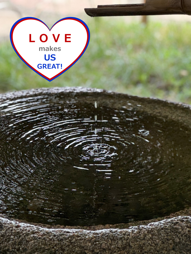 drop of water falling from a pipe into a basin created concentric ripples
